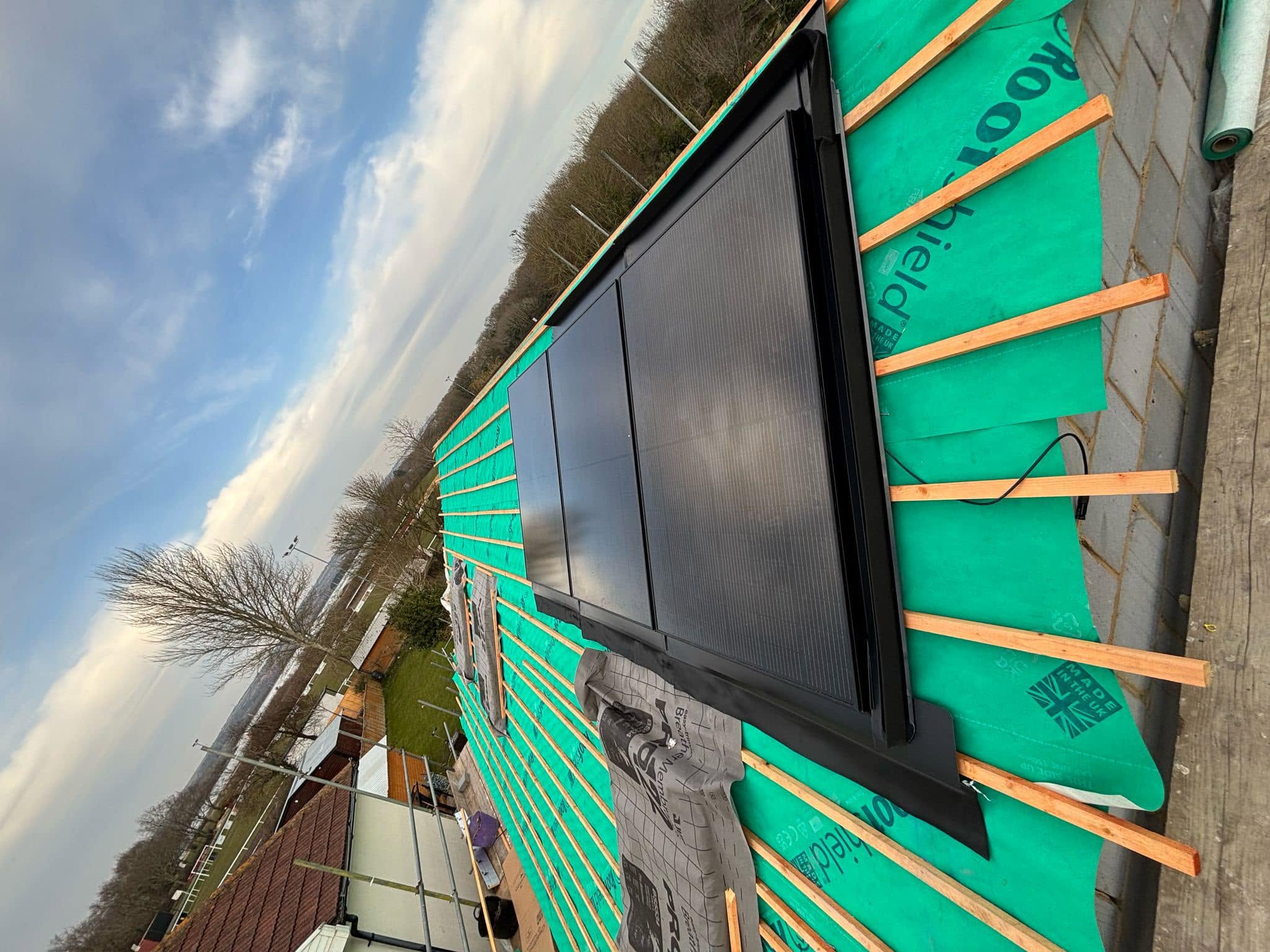 In-roof solar panels being installed